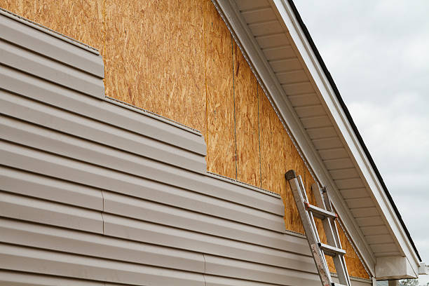 Professional Siding Installation technician working in Larkspur, CO